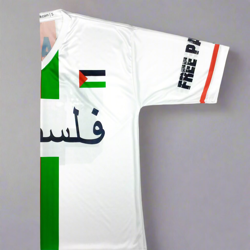 White shirt with Palestinian flag design and text on a white background