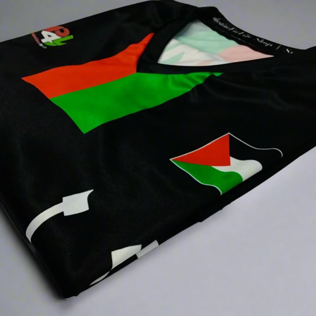 Black Palestine jersey shirt on a light gray background