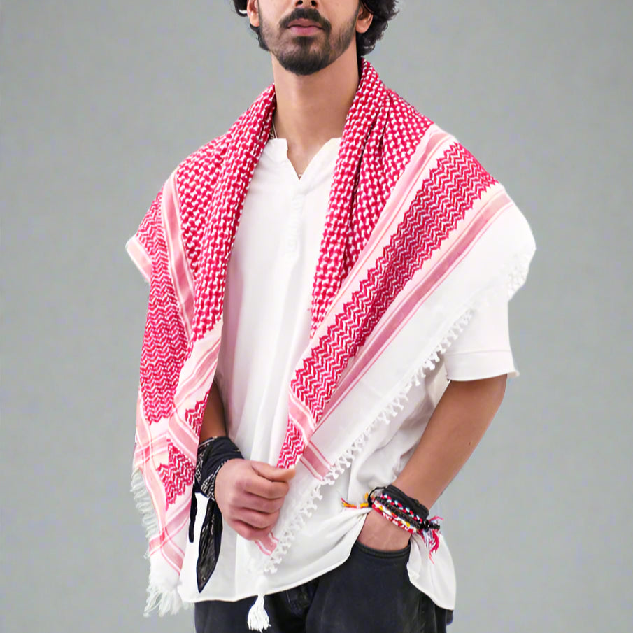 Man wearing a red and white checkered scarf